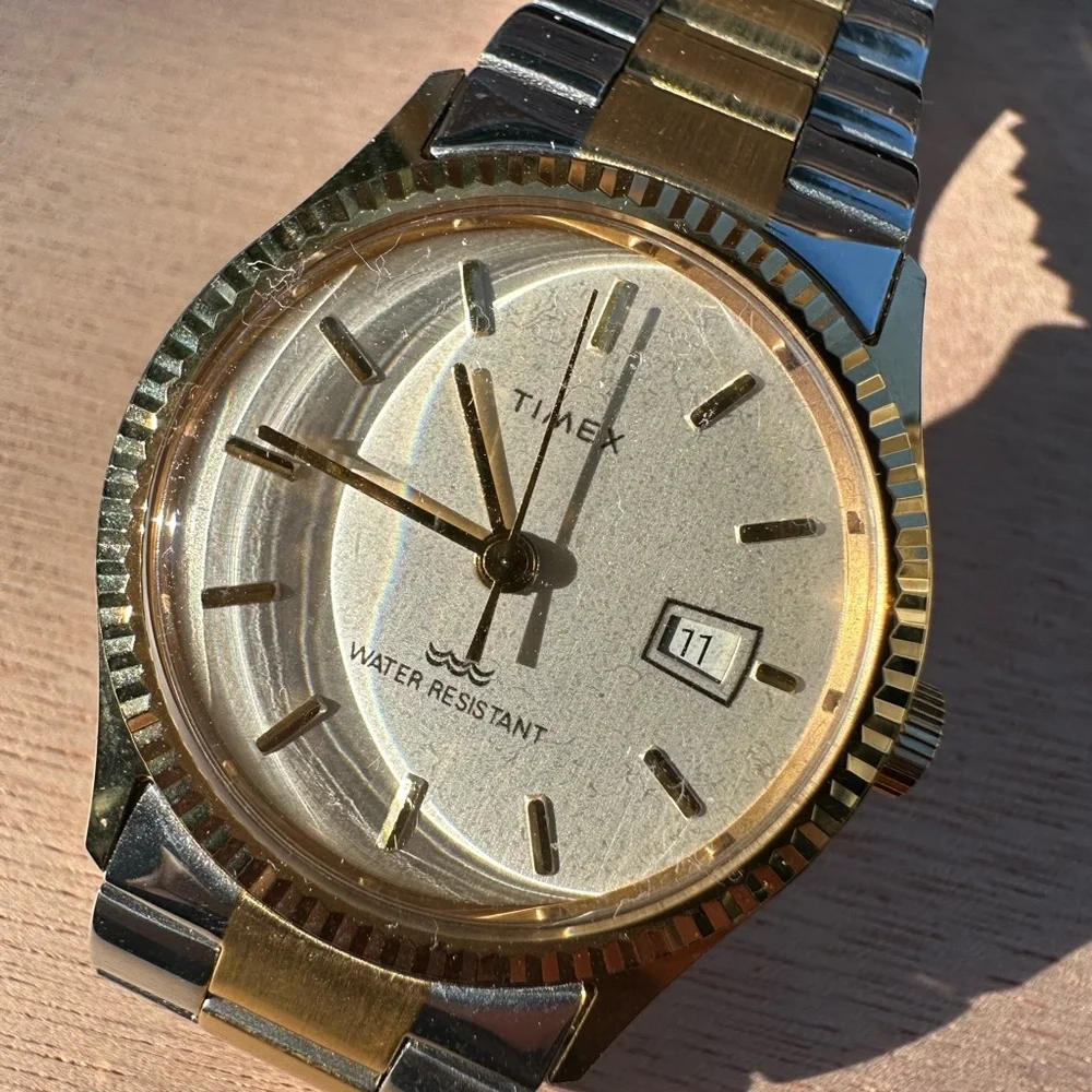 Timex Gold and Silver Watch with Date Display